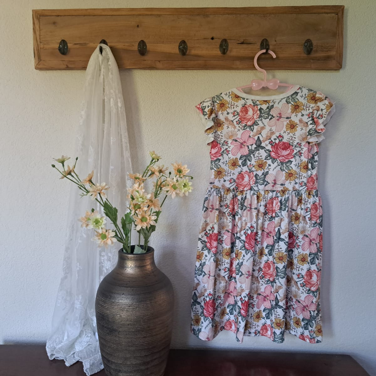 Gebloemd jurkje met kapmouw