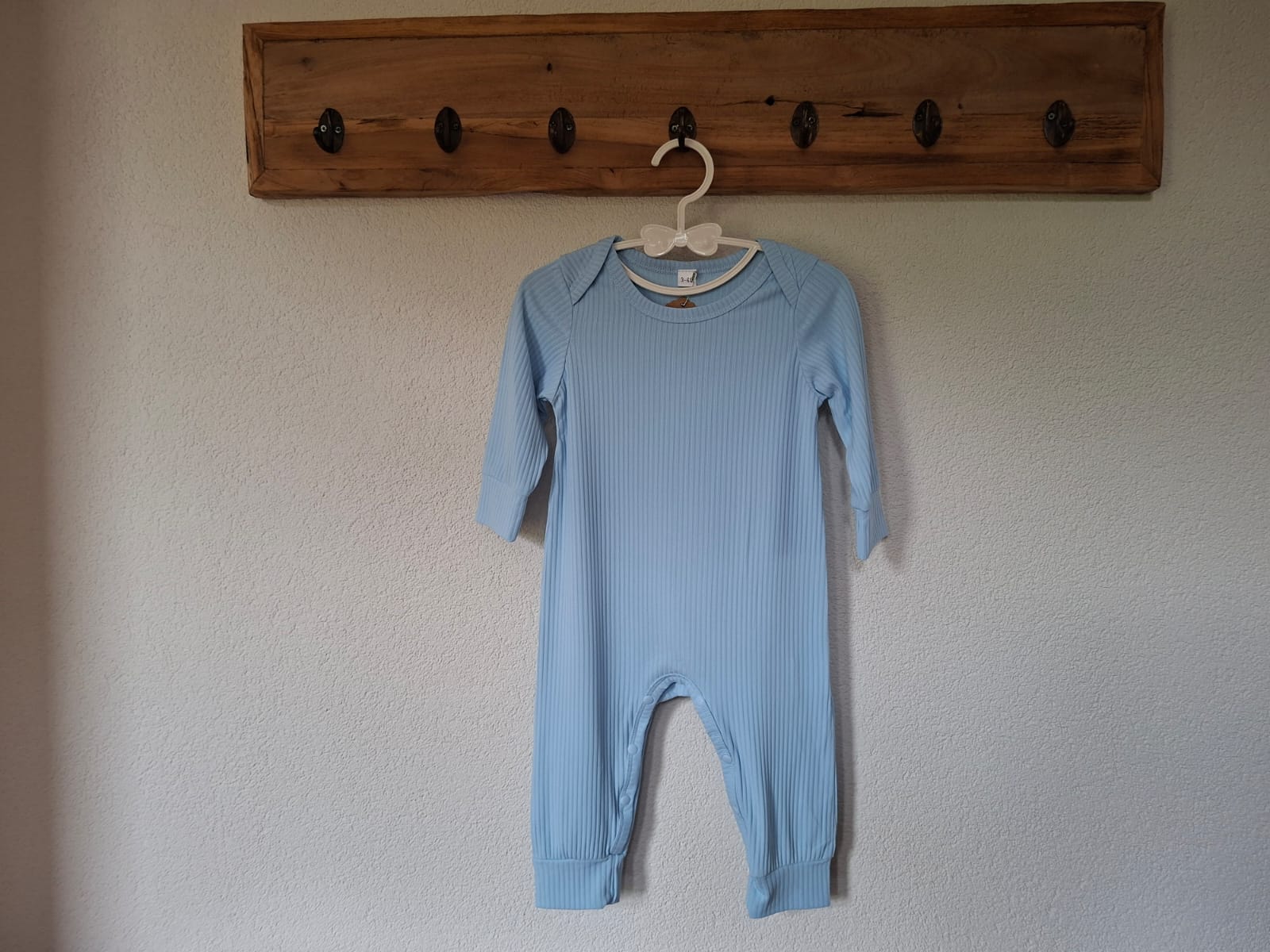 Babyblauw rompertje ribstof